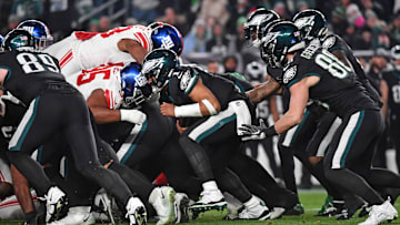 Dec 25, 2023; Philadelphia, Pennsylvania, USA; Philadelphia Eagles quarterback Jalen Hurts (1) picks up a first down during the third quarter against the New York Giants at Lincoln Financial Field. Mandatory Credit: Eric Hartline-Imagn Images