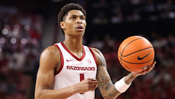 Nov 18, 2025; Fayetteville, Arkansas, USA; Arkansas Razorbacks guard Meleek Thomas (1) shoots a free throw against the Winthrop Eagles during the first half at Bud Walton Arena. Arkansas won 84-83. Mandatory Credit: Nelson Chenault-Imagn Images
