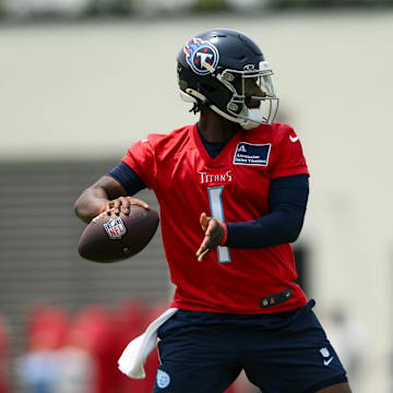 Jun 10, 2025; Nashville, TN, USA;Tennessee Titans quarterback Cam Ward (1) throws a pass  during minicamp at Nissan Stadium. Mandatory Credit: Steve Roberts-Imagn Images