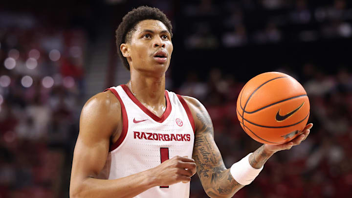 Nov 18, 2025; Fayetteville, Arkansas, USA; Arkansas Razorbacks guard Meleek Thomas (1) shoots a free throw against the Winthrop Eagles during the first half at Bud Walton Arena. Arkansas won 84-83. Mandatory Credit: Nelson Chenault-Imagn Images
