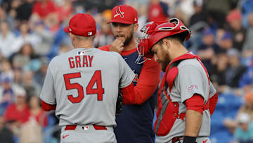 Mar 10, 2025; Port St. Lucie, Florida, USA;  St. Louis Cardinals pitching coach Dusty Blake talks with pitcher Sonny Gray (54) and catcher Pedro Pagés (43) during the second  inning against the New York Mets at Clover Park. Mandatory Credit: Reinhold Matay-Imagn Images