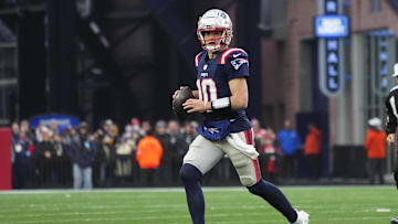 Dec 28, 2024; Foxborough, Massachusetts, USA; New England Patriots quarterack Drake Maye (10) runs with the ball against the Los Angeles Chargers during the second half at Gillette Stadium. Mandatory Credit: Gregory Fisher-Imagn Images