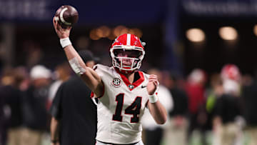 Dec 6, 2025; Atlanta, GA, USA; Georgia Bulldogs quarterback Gunner Stockton (14) warms up before the game against the Alabama Crimson Tide during the 2025 SEC Championship game at Mercedes-Benz Stadium. Mandatory Credit: Brett Davis-Imagn Images