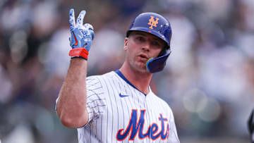 May 27, 2025; New York City, New York, USA; New York Mets first baseman Pete Alonso (20) reacts after hitting a two run home run during the first inning against the Chicago White Sox at Citi Field. Mandatory Credit: Vincent Carchietta-Imagn Images