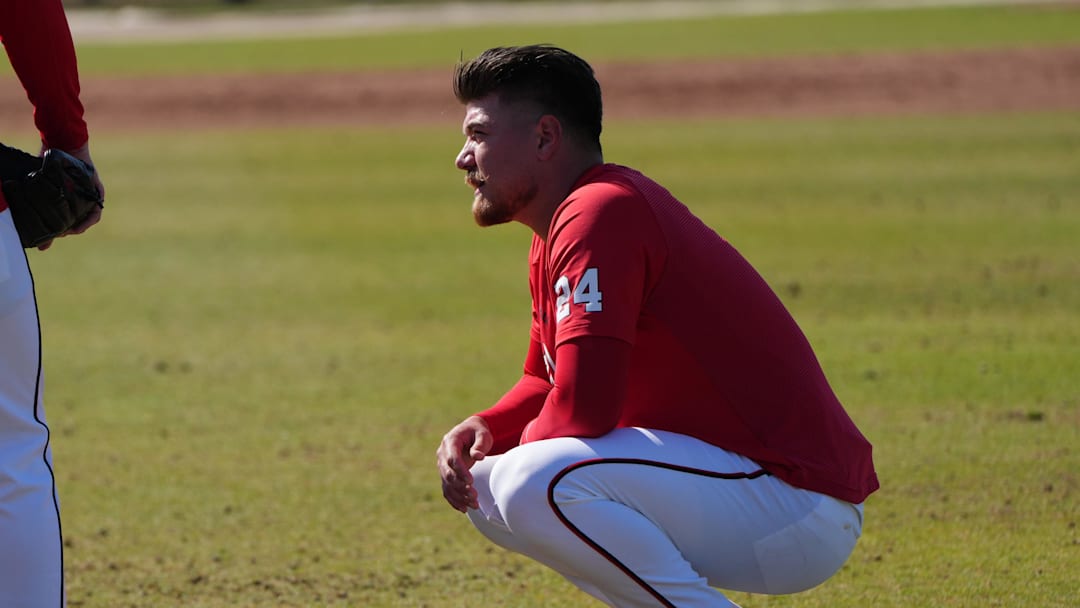 Feb 13, 2026; West Palm Beach, FL, USA;  Washington Nationals pitcher Cade Cavalli (24) takes a break during spring training. Mandatory Credit: Jim Rassol-Imagn Images