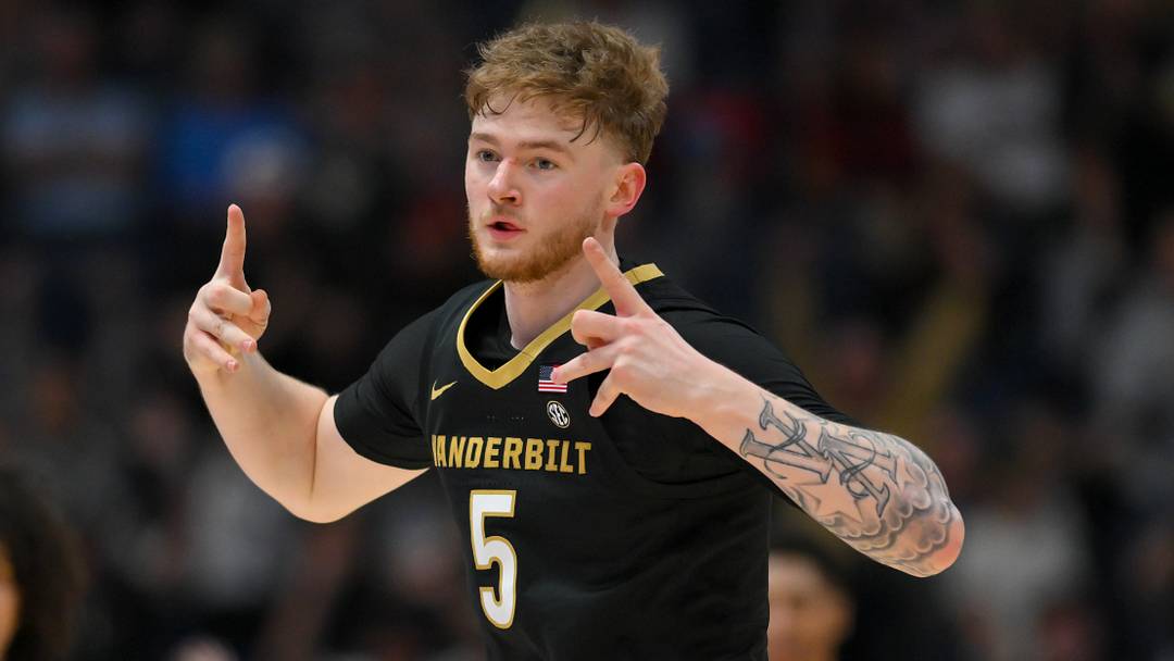 Vanderbilt Commodores forward Tyler Nickel (5) reacts after a made three point basket against the Arkansas Razorbacks during the first half during the men's SEC Conference Tournament Championship at Bridgestone Arena.