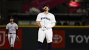 Sep 23, 2025; Seattle, Washington, USA; Seattle Mariners first baseman Josh Naylor (12) reacts after hitting a three-run double against the Colorado Rockies during the eighth inning at T-Mobile Park. 