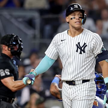 Sep 9, 2024; Bronx, New York, USA; New York Yankees designated hitter Aaron Judge (99) reacts after striking out during the third inning against the Kansas City Royals at Yankee Stadium. Mandatory Credit: Brad Penner-Imagn Images