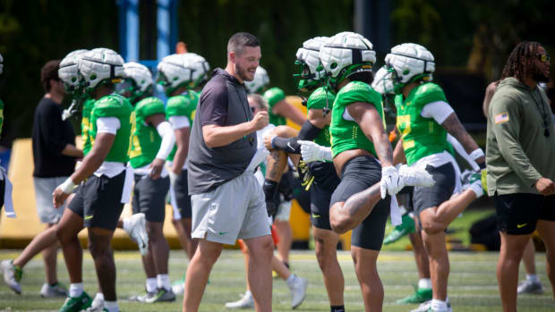 Oregon head coach Dan Lanning walks the field during the Ducks’ fall camp Wednesday, Aug. 7, 2024, at the Hatfield-Dowlin Com