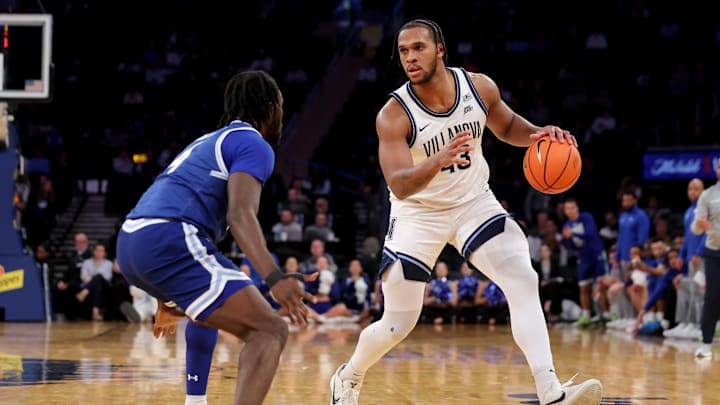 Mar 12, 2025; New York, NY, USA; Villanova Wildcats forward Eric Dixon (43) controls the ball against Seton Hall Pirates forward Prince Aligbe (4) during the second half at Madison Square Garden. Mandatory Credit: Brad Penner-Imagn Images