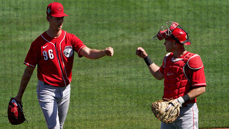 Cincinnati Reds non-roster invitee pitcher Brandon Williamson (96) fist bumps.