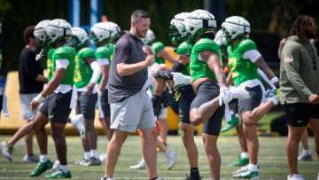 Oregon head coach Dan Lanning walks the field during the Ducks’ fall camp Wednesday, Aug. 7, 2024, at the Hatfield-Dowlin Complex in Eugene, Ore.