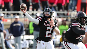 Nov 30, 2024; Lubbock, Texas, USA;  Texas Tech Red Raiders quarterback Behren Morton (2) throws  against the West Virginia Mountaineers in the second half at Jones AT&T Stadium and Cody Campbell Field. Mandatory Credit: Michael C. Johnson-Imagn Images