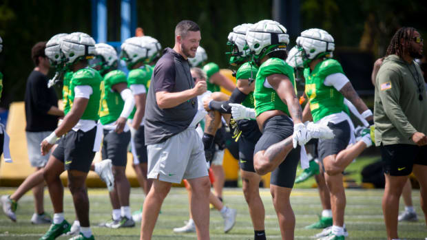 Oregon head coach Dan Lanning walks the field during the Ducks’ fall camp Wednesday, Aug. 7, 2024, at the Hatfield-Dowlin Com