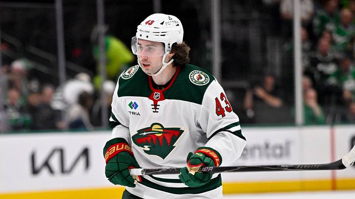 Apr 9, 2026; Dallas, Texas, USA; Minnesota Wild defenseman Quinn Hughes (43) skates against the Dallas Stars during the game between the Stars and the Wild at American Airlines Center. Mandatory Credit: Jerome Miron-Imagn Images
