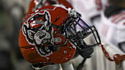 Nov 13, 2021; Winston-Salem, North Carolina, USA; A North Carolina State Wolfpack helmet seen on the sideline during the second half against the Wake Forest Demon Deacons at Truist Field. Mandatory Credit: William Howard-Imagn Images