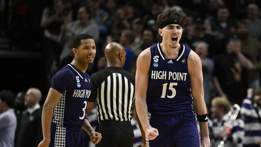 High Point guard Rob Martin (3) and forward Braden Hausen (15) react during their win over Wisconsin.
