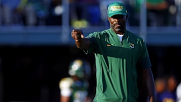 Aug 28, 2025; Norfolk, VA, USA; Norfolk State Spartans head coach Michael Vick watches his team warm up before the game against the Towson Tigers at William Price Stadium. Mandatory Credit: Peter Casey-Imagn Images
