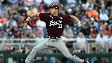 Jun 19, 2024; Omaha, NE, USA;  Texas A&M Aggies starting pitcher Justin Lamkin (33) throws against the Florida Gators during the first inning at Charles Schwab Field Omaha. Mandatory Credit: Steven Branscombe-Imagn Images