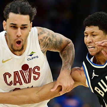 Dec 20, 2024; Cleveland, Ohio, USA; Cleveland Cavaliers forward Jaylon Tyson (24) drives to the basket against Milwaukee Bucks forward MarJon Beauchamp (3) during the second half at Rocket Mortgage FieldHouse. Mandatory Credit: Ken Blaze-Imagn Images