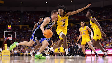 Arizona State's Amier Ali defends against BYU's Trevin Knell during the Sun Devils' 91-81 loss to the Cougars on Wednesday, Feb. 26, 2025.