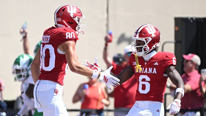 Sep 5, 2026; Bloomington, Indiana, USA;  Indiana Hoosiers wide receiver Charlie Becker (80) reacts with wide receiver LeBron Bond (6) after catching a touchdown pass against the North Texas Mean Green during the third quarter at Merchants Bank Field at Memorial Stadium.  Mandatory Credit: Robert Goddin-Imagn Images