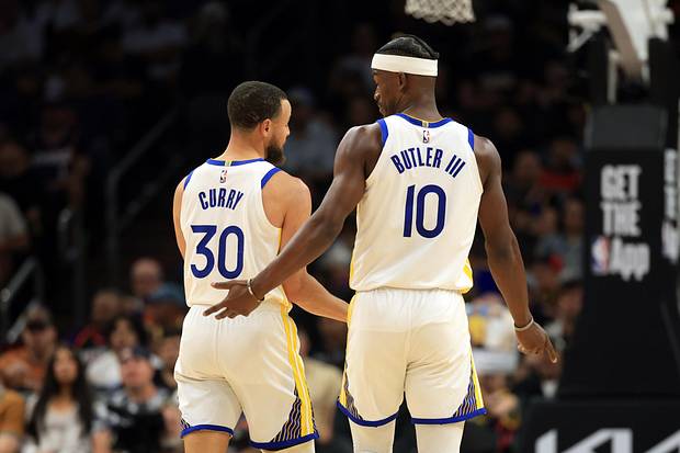 Golden State Warriors forward Jimmy Butler III (10) with guard Stephen Curry