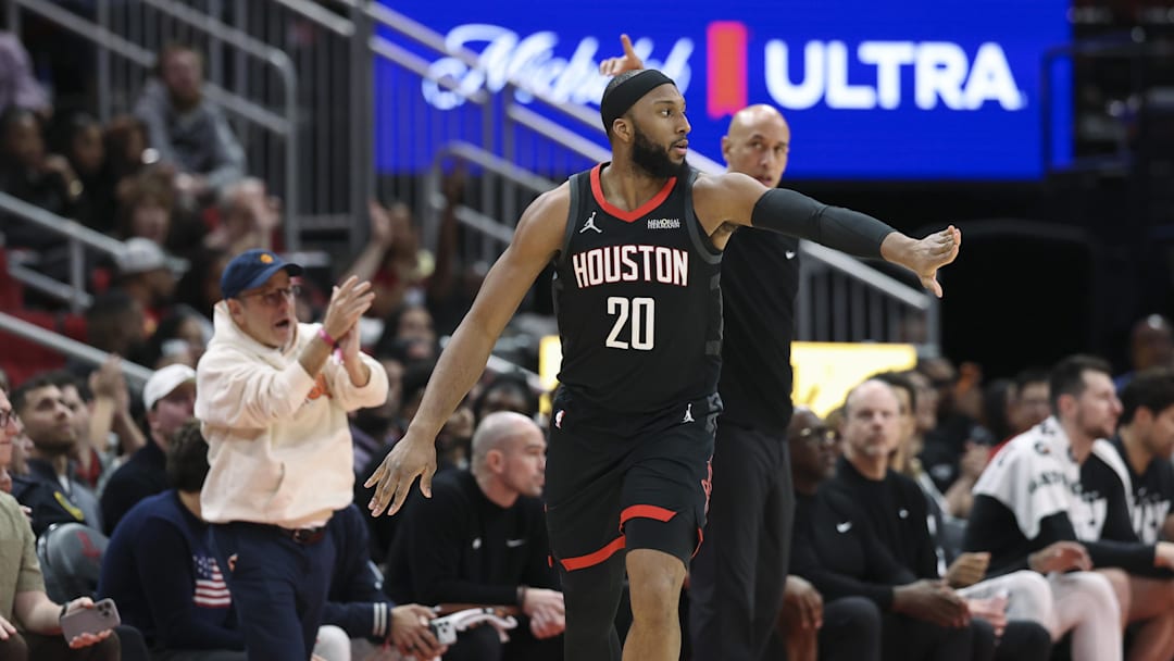 Feb 25, 2026; Houston, Texas, USA; Houston Rockets guard Josh Okogie (20) reacts after scoring a basket during the third quarter against the Sacramento Kings at Toyota Center. Mandatory Credit: Troy Taormina-Imagn Images
