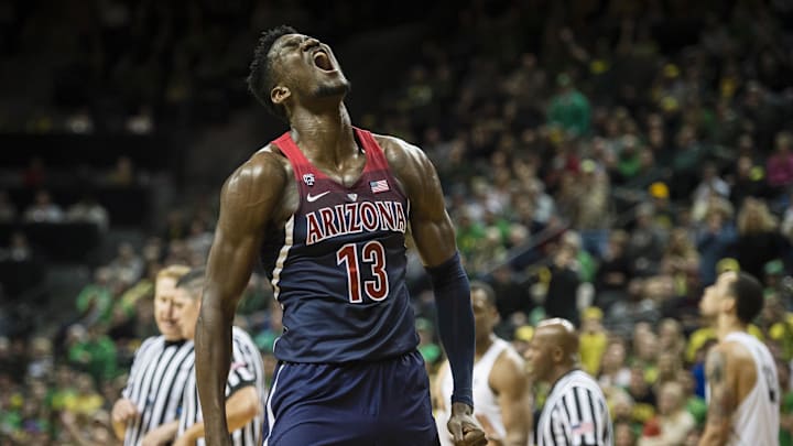 Feb 24, 2018; Eugene, OR, USA; Arizona Wildcats forward Deandre Ayton (13) shouts after a play during the second half against the Oregon Ducks at Matthew Knight Arena. Oregon won 98-93 in overtime. Mandatory Credit: Troy Wayrynen-Imagn Images