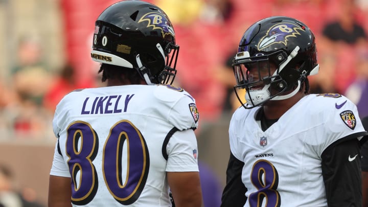 Aug 26, 2023; Tampa, Florida, USA; Baltimore Ravens quarterback Lamar Jackson (8) and tight end Isaiah Likely (80) talk as they workout against the Tampa Bay Buccaneers prior to the game at Raymond James Stadium. Mandatory Credit: Kim Klement Neitzel-USA TODAY Sports