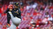 Sep 23, 2025; Cincinnati, Ohio, USA; Pittsburgh Pirates starting pitcher Johan Oviedo (24) pitches against the Cincinnati Reds in the first inning at Great American Ball Park. Mandatory Credit: Katie Stratman-Imagn Images
