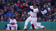 Apr 2, 2023; Boston, Massachusetts, USA; Boston Red Sox right fielder Alex Verdugo (99) gets a hit to drive in a run against th eBaltimore Orioles in the eighth inning at Fenway Park. Mandatory Credit: David Butler II-Imagn Images
