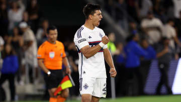 Jul 30, 2024; Los Angeles, California, USA;  Vancouver Whitecaps FC defender Mathias Laborda (2) celebrates after scoring a goal in a penalty shootout to win the game against LAFC at BMO Stadium. Mandatory Credit: Kiyoshi Mio-USA TODAY Sports