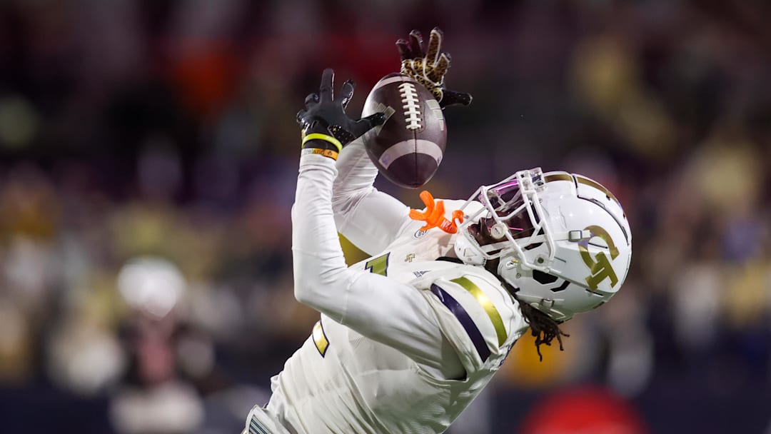 Nov 21, 2024; Atlanta, Georgia, USA; Georgia Tech Yellow Jackets wide receiver Eric Singleton Jr. (2) catches a pass against the North Carolina State Wolfpack in the fourth quarter at Bobby Dodd Stadium at Hyundai Field. Mandatory Credit: Brett Davis-Imagn ImagesImages