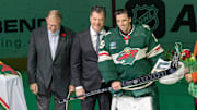 Feb 9, 2024; Saint Paul, Minnesota, USA; Minnesota Wild owner, Craig Leipold and general manager Bill Guerin award Minnesota Wild goaltender Marc-Andre Fleury (29) with a silver hockey stick in a pregame ceremony in honor of 552 wins and 1000 games played in the NHL before the game against the Pittsburgh Penguins at Xcel Energy Center. Mandatory Credit: Matt Blewett-Imagn Images