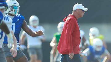 Kansas head coach Lance Leipold walks towards positions during practice at the Murfin Family Practice Fields on Aug. 8, 2025.