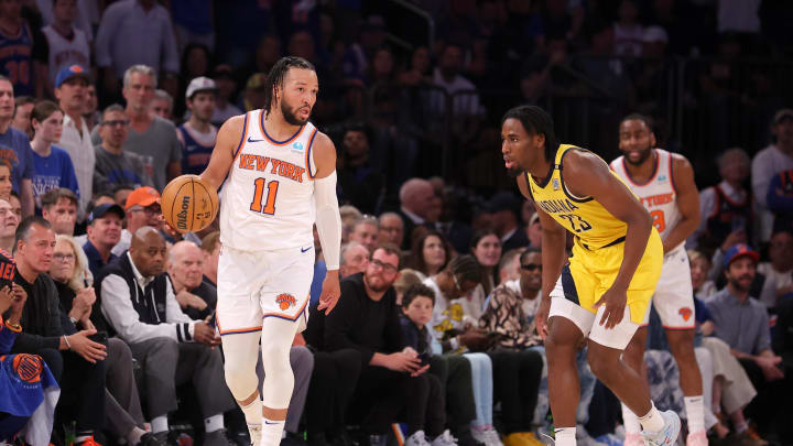 May 19, 2024; New York, New York, USA; New York Knicks guard Jalen Brunson (11) controls the ball against Indiana Pacers forward Aaron Nesmith (23) during the second quarter of game seven of the second round of the 2024 NBA playoffs at Madison Square Garden. Mandatory Credit: Brad Penner-USA TODAY Sports