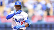 Los Angeles Dodgers outfielder Esteury Ruiz (27) rounds the bases after he hit a solo home run against the Milwaukee Brewers during the fifth inning at Dodger Stadium. 