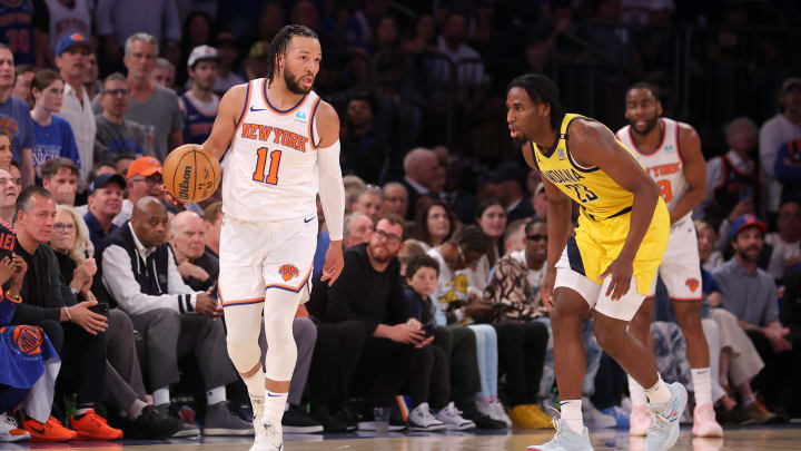 May 19, 2024; New York, New York, USA; New York Knicks guard Jalen Brunson (11) controls the ball against Indiana Pacers forward Aaron Nesmith (23) during the second quarter of game seven of the second round of the 2024 NBA playoffs at Madison Square Garden. Mandatory Credit: Brad Penner-USA TODAY Sports