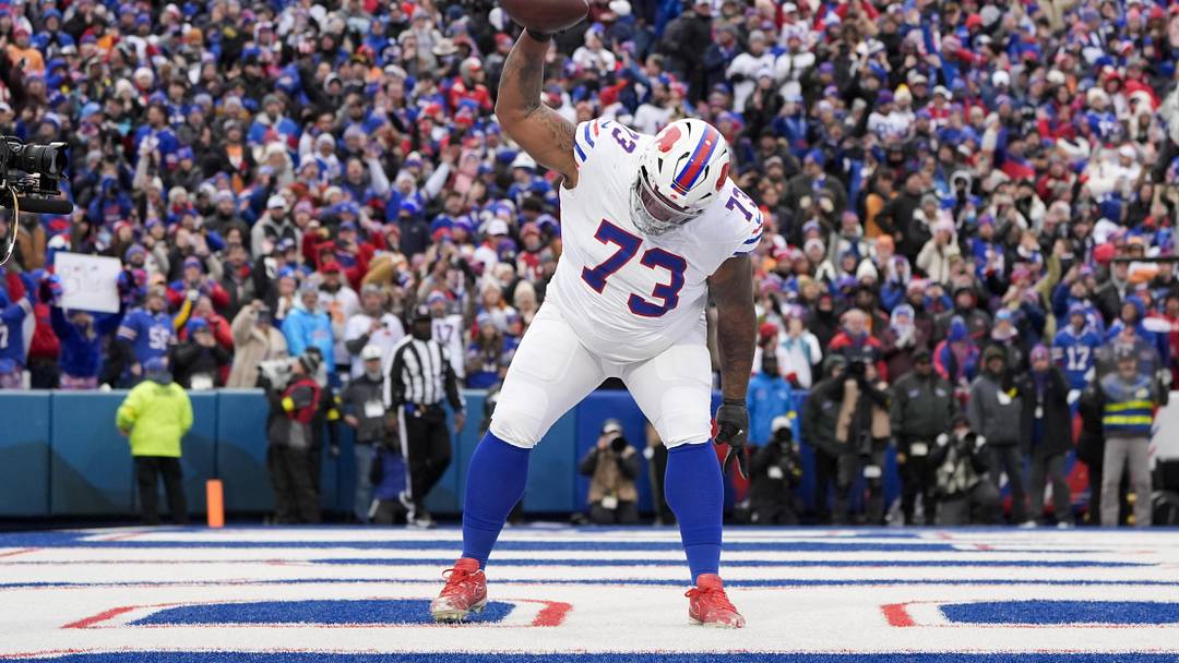 Nov 16, 2025; Orchard Park, New York, USA;  Buffalo Bills offensive tackle Dion Dawkins (73) celebrates Josh Allen’s first quarter touchdown against the Tampa Bay Buccaneers at Highmark Stadium. Mandatory Credit: Gregory Fisher-Imagn Images