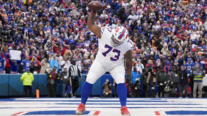 Nov 16, 2025; Orchard Park, New York, USA;  Buffalo Bills offensive tackle Dion Dawkins (73) celebrates Josh Allen’s first quarter touchdown against the Tampa Bay Buccaneers at Highmark Stadium. Mandatory Credit: Gregory Fisher-Imagn Images