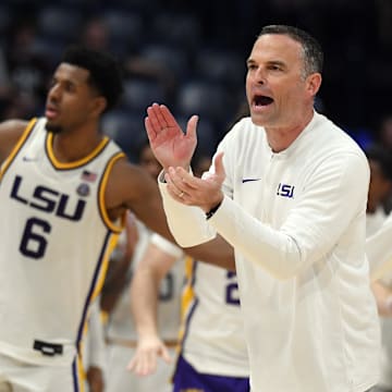 Mar 14, 2024; Nashville, TN, USA; LSU Tigers head coach Matt McMahon claps for his players during a timeout during the second half against the Mississippi State Bulldogs at Bridgestone Arena. Mandatory Credit: Christopher Hanewinckel-Imagn Images