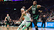 May 14, 2025; Boston, Massachusetts, USA; New York Knicks guard Josh Hart (3) loses his balance while Boston Celtics center Al Horford (42) defends in the first half during game five of the second round for the 2025 NBA Playoffs at TD Garden. Mandatory Credit: Bob DeChiara-Imagn Images