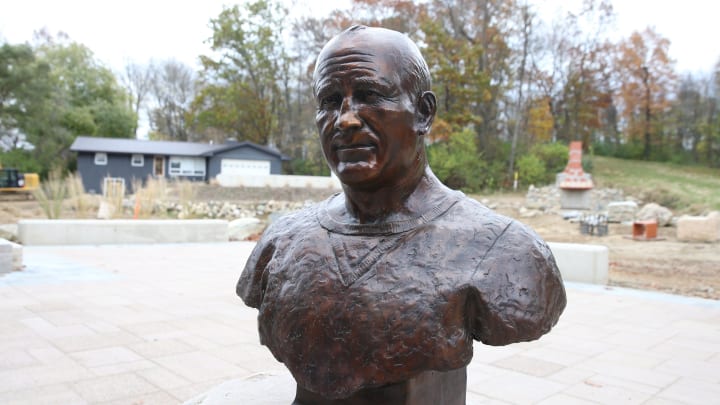 A bust of legendary Notre Dame football coach Knute Rockne sits on a patio Monday, Nov. 6, 2023, at the site of the new Indiana Dinosaur Museum and South Bend Chocolate Factory complex on U.S. 20 west of the St. Joseph Valley Parkway.