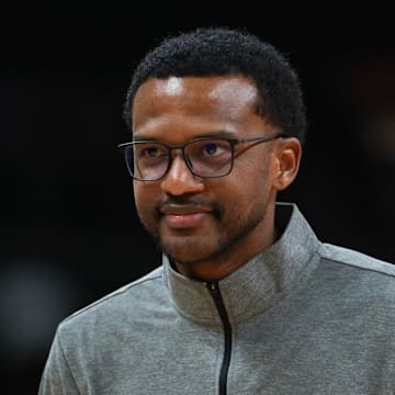 Nov 3, 2025; Coral Gables, Florida, USA; Miami Hurricanes head coach Jai Lucas looks on after the game against the Jacksonville Dolphins at Watsco Center. Mandatory Credit: Sam Navarro-Imagn Images