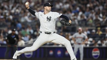 Jul 3, 2024; Bronx, New York, USA; New York Yankees pitcher Clay Holmes (35) pitches in the ninth inning against the Cincinnati Reds at Yankee Stadium. Mandatory Credit: Wendell Cruz-USA TODAY Sports