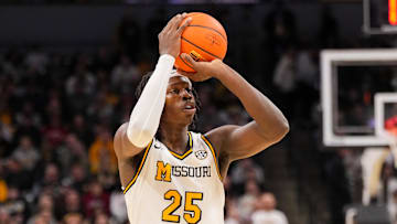 Feb 19, 2025; Columbia, Missouri, USA; Missouri Tigers guard Mark Mitchell (25) shoots against the Alabama Crimson Tide during the first half at Mizzou Arena. Mandatory Credit: Denny Medley-Imagn Images