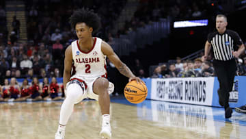 Mar 23, 2025; Cleveland, OH, USA; Alabama Crimson Tide guard Aden Holloway (2) dribbles in the second half against the St. Mary's Gaels during the NCAA Tournament Second Round at Rocket Arena. Mandatory Credit: Rick Osentoski-Imagn Images