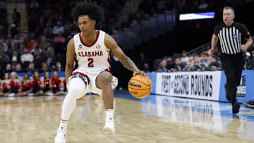 Mar 23, 2025; Cleveland, OH, USA; Alabama Crimson Tide guard Aden Holloway (2) dribbles in the second half against the St. Mary's Gaels during the NCAA Tournament Second Round at Rocket Arena. Mandatory Credit: Rick Osentoski-Imagn Images