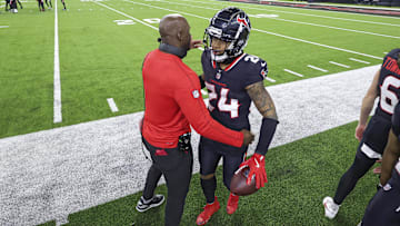 Jan 11, 2025; Houston, Texas, USA; Houston Texans head coach DeMeco Ryans embraces cornerback Derek Stingley Jr. (24) after a Stingley interception during the game against the Los Angeles Chargers in an AFC wild card game at NRG Stadium. Mandatory Credit: Troy Taormina-Imagn Images
